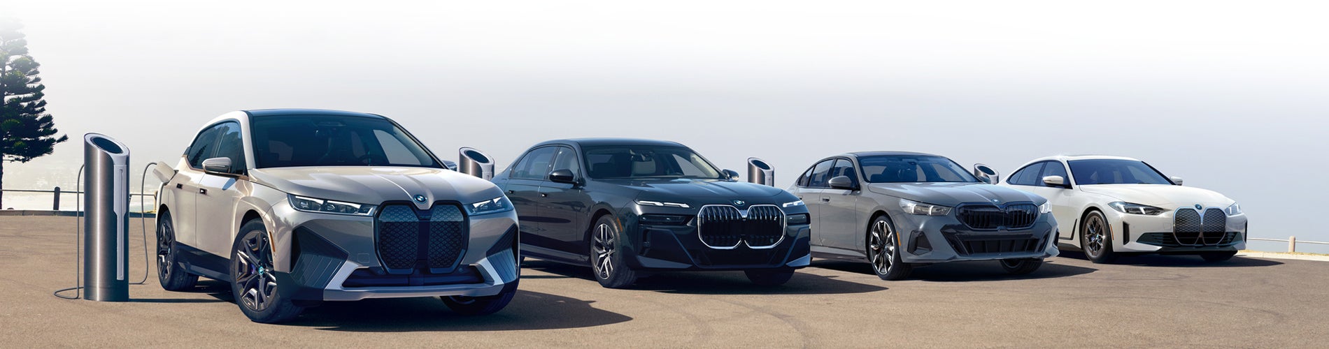 Four BMW Electric Vehicles parked in parking lot
